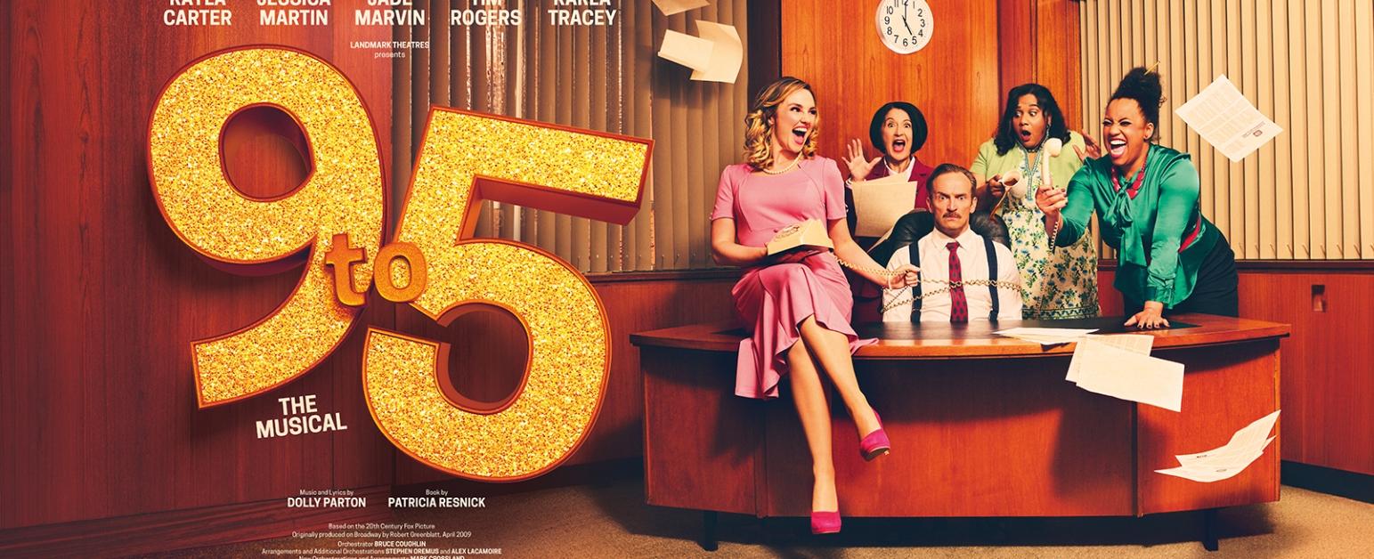 9 to 5 cast around a desk