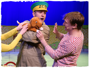 Puppet dog jumping in mans face