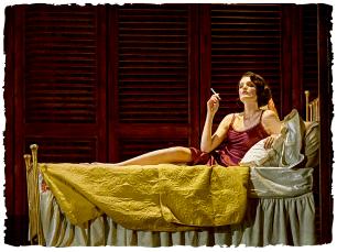 an actress sitting on a bed holding a cigarette