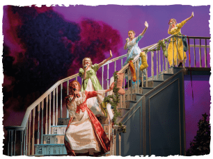 Girls all stood down grand staircase