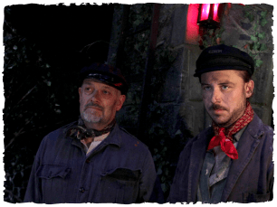 2 men staring in to distance