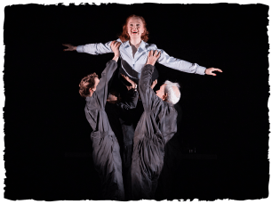 AN actor being lifted on stage