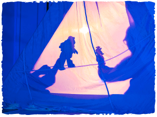 A shadow puppet in blue light