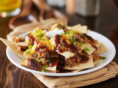 Nachos and sauces on a plate