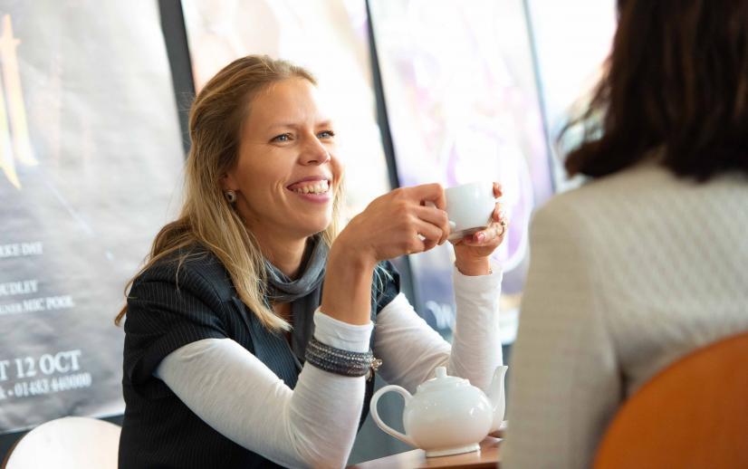 A customer enjoying a coffee in our cafe