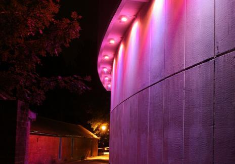 An external image of our venue at night.
