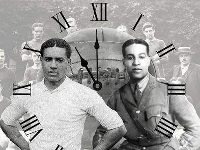 a black and white photo of 2 men in front of a clock and figures behind that