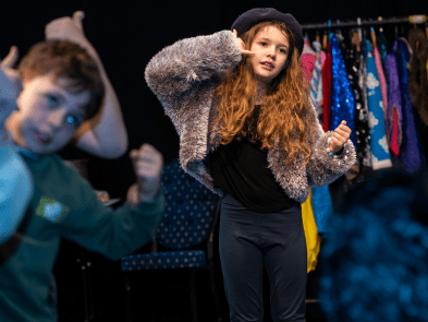 A girl pretending to be on the phone