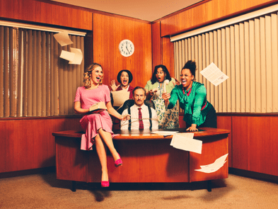 9 to 5 cast around a desk